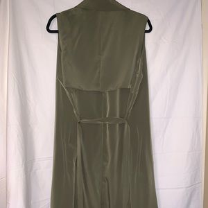 Long vest with belt.